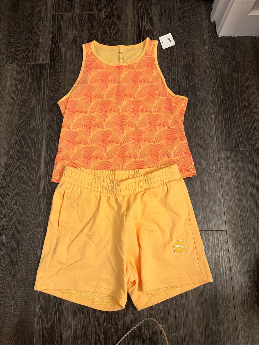 NWT. Puma Bright Orange Patterned Tank with Light Orange Shorts. Size S